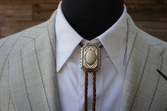 Bolo Tie Scalloped Edge Silver Riverstone (white) Antique Brown Cord