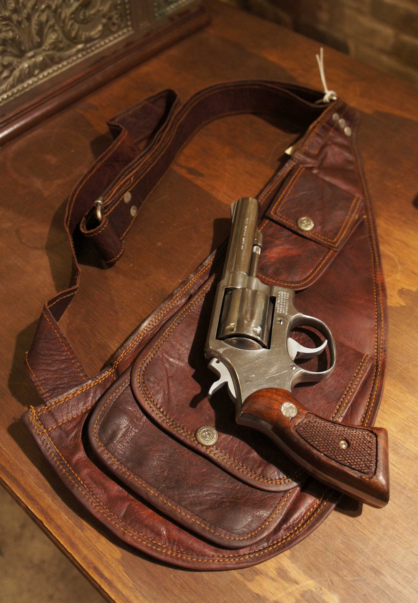 Gun leather clutch bag
